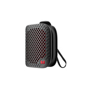 A portable black Bluetooth speaker with a clip-on feature and an IPX7 waterproof design, depicted against a white background.