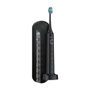 A black Green Lion Smart Brush rechargeable toothbrush with a blue bristle head, displayed alongside its charging dock.