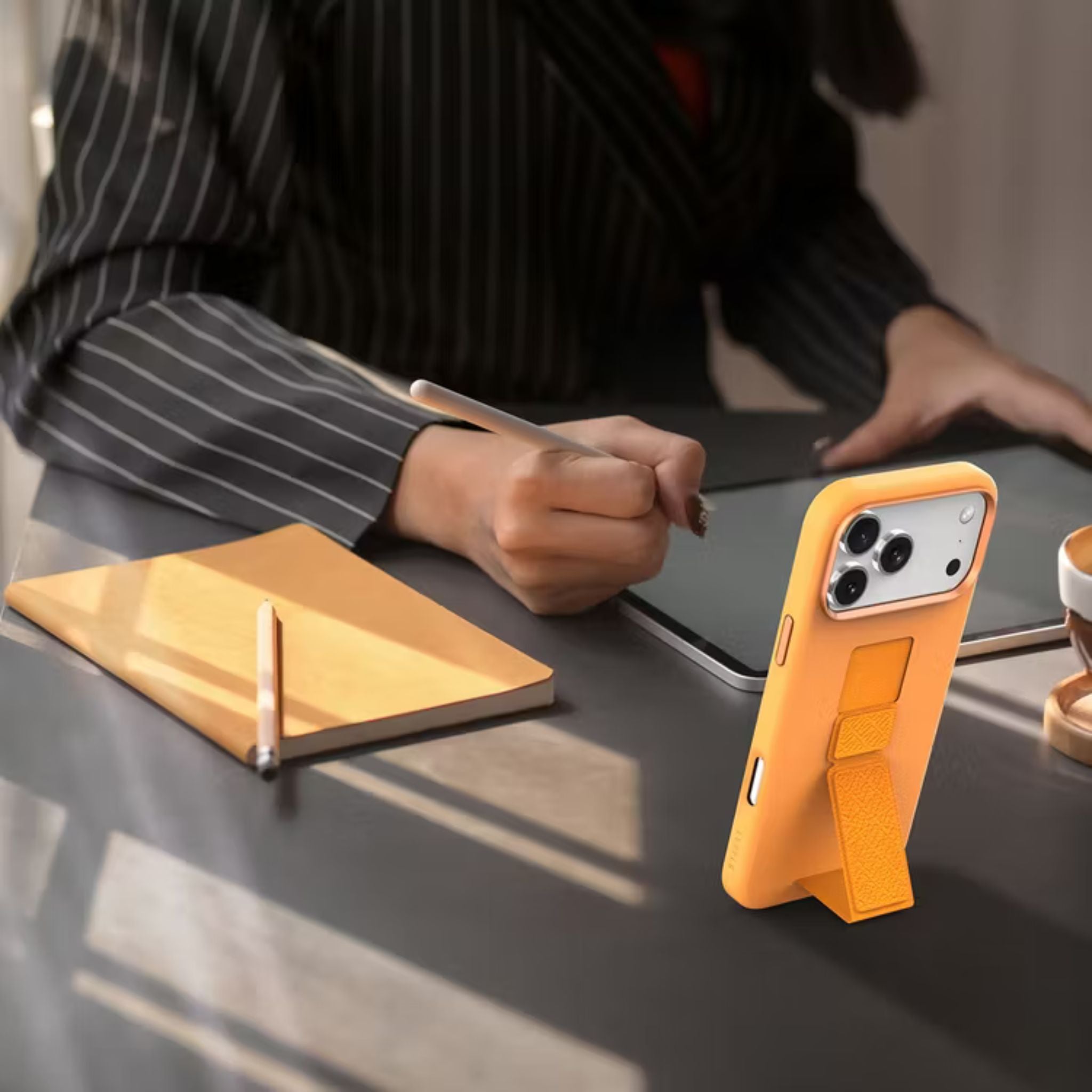 Levelo Morphix Silicone GripStand Case for iPhone 17 Pro, Hands-Free Viewing, True Microfiber Interior Lining, Horizontal & Vertical Stand, Shock-Resistant Bumper, Raised Bezels for Camera & Screen, Slim Fit Design - Orange