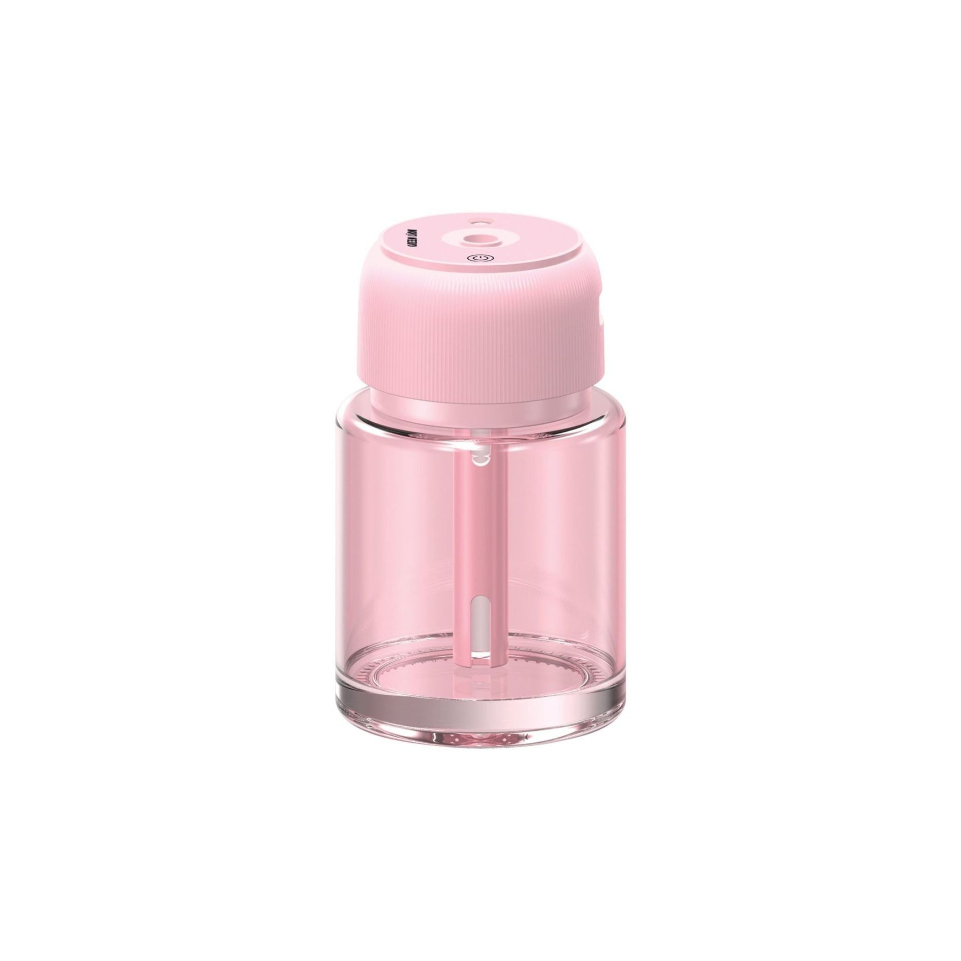 A pink Green Lion fragrance air diffuser with a clear glass body and a pink lid.